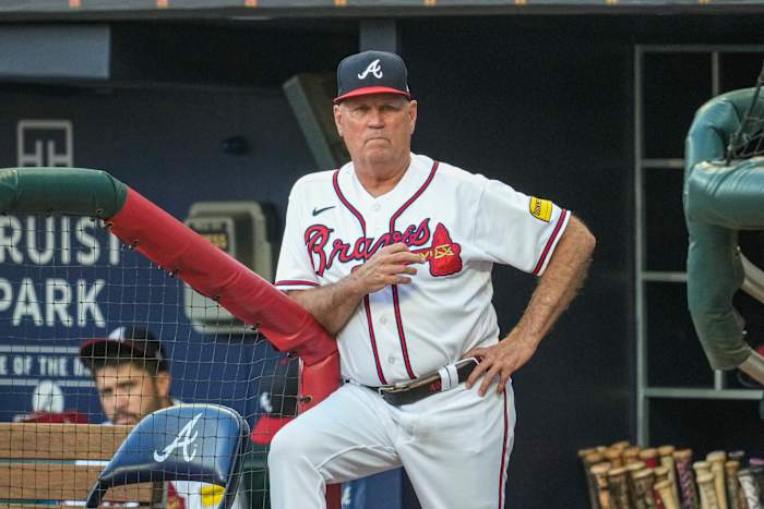 Aug 23, 2023; Cumberland, Georgia, USA; Atlanta Braves manager Brian Snitker (43) shown in the dugout against the New York Mets during the first inning at Truist Park. Mandatory Credit: Dale Zanine-USA TODAY Sports